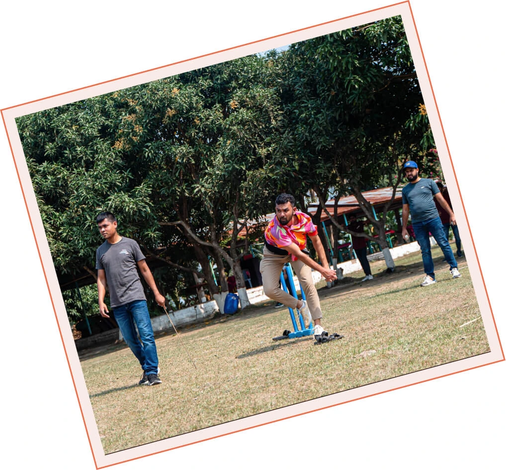 A Panze team member bowling during a friendly cricket match