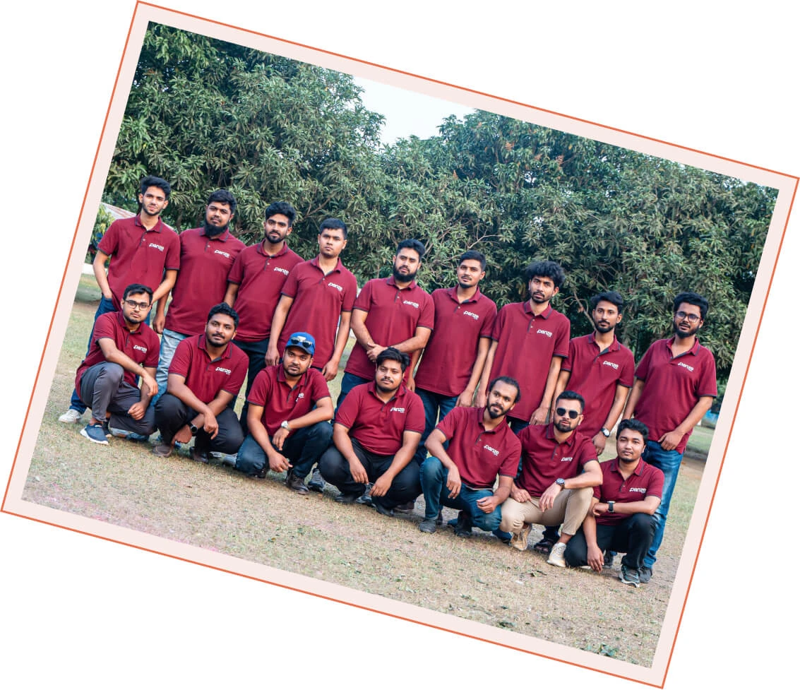 The Panze team outdoors in matching maroon Panze polo shirts